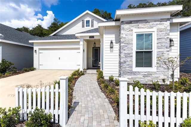 view of front of house with a garage