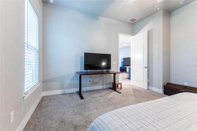 bedroom with carpet and ceiling fan