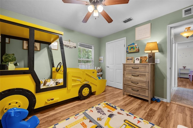 game room featuring ceiling fan and light hardwood / wood-style flooring