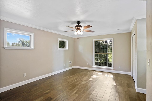 unfurnished room with ceiling fan, dark hardwood / wood-style flooring, and crown molding