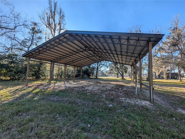 view of vehicle parking with a carport