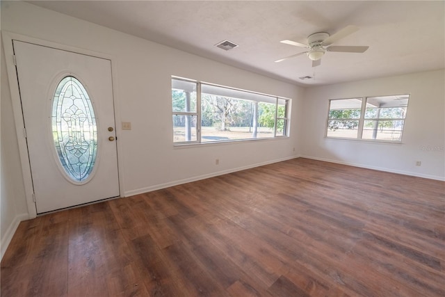 foyer featuring ceiling fan and dark hardwood / wood-style floors