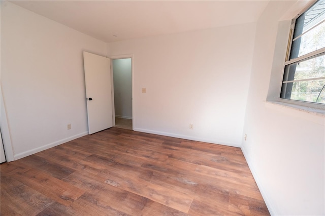 empty room featuring hardwood / wood-style floors