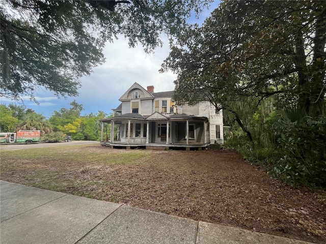 815 E University Ave, Gainesville, FL 32601 - view of front facade featuring a porch