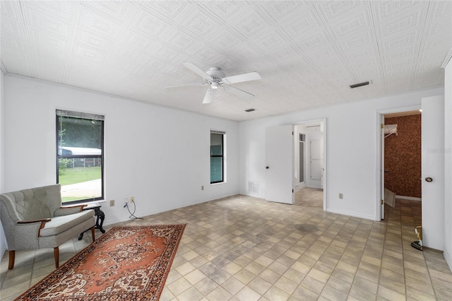 interior space featuring ceiling fan