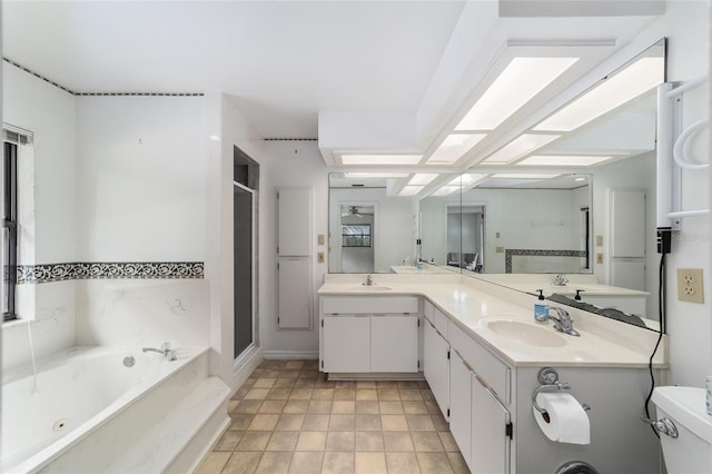 full bathroom featuring tile patterned flooring, vanity, toilet, and shower with separate bathtub