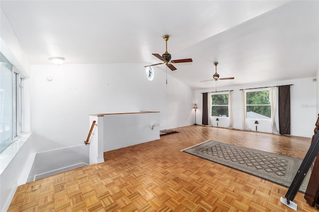 unfurnished living room with light parquet floors and ceiling fan