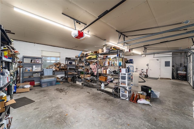 garage featuring a workshop area and a garage door opener