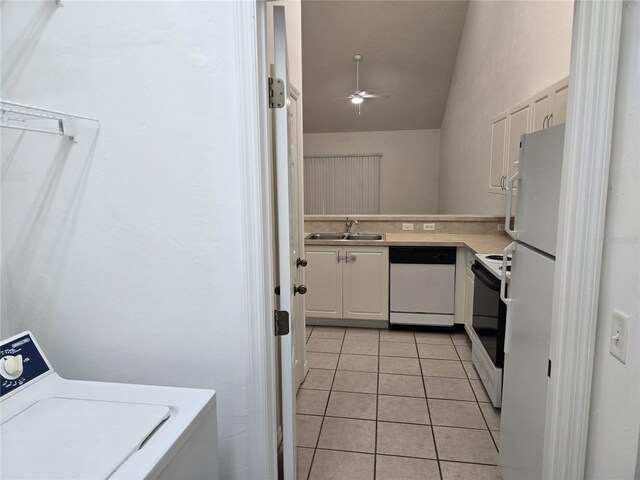 laundry room with sink, washer / clothes dryer, ceiling fan, and light tile patterned flooring