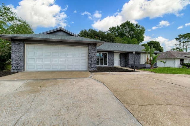 single story home with a garage