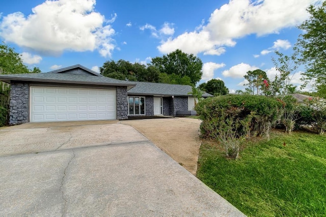 ranch-style house featuring a garage