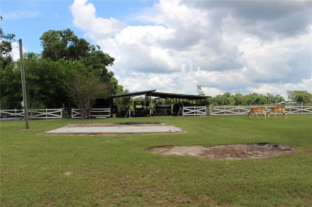 view of home's community featuring a lawn