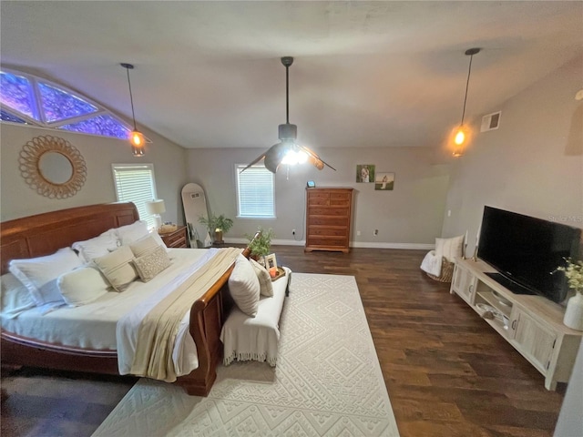 bedroom with lofted ceiling and dark hardwood / wood-style flooring