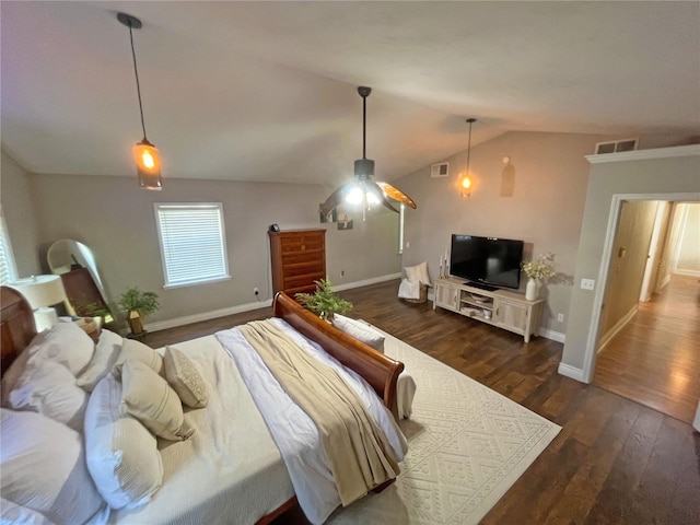 bedroom featuring vaulted ceiling and dark wood-type flooring