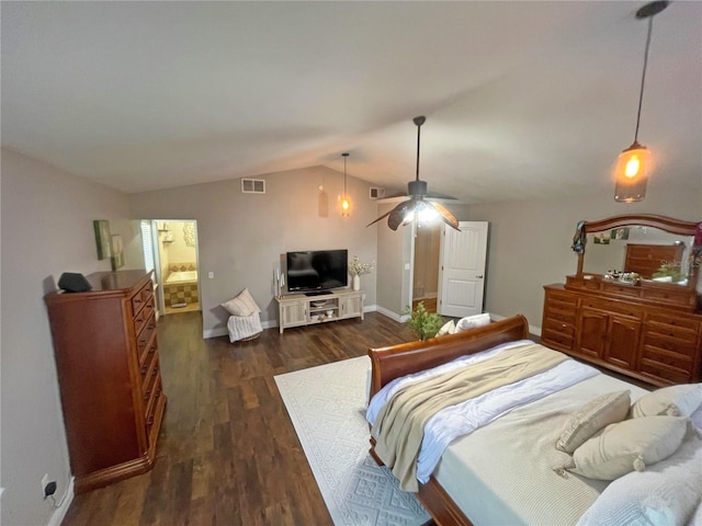 bedroom with lofted ceiling and dark wood-type flooring