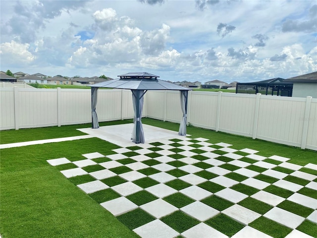 view of yard with a gazebo and a patio area