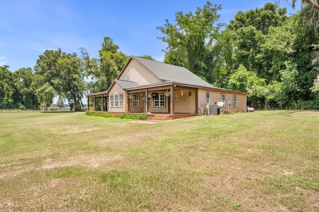 view of front of home with a front lawn and covered porch