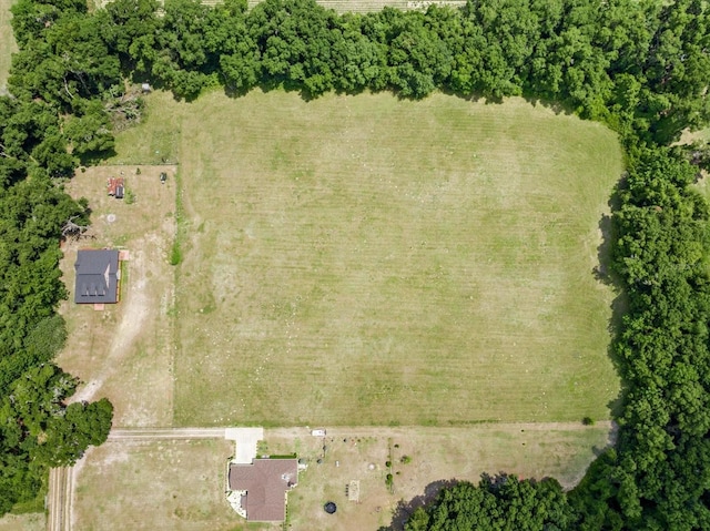 birds eye view of property with a rural view