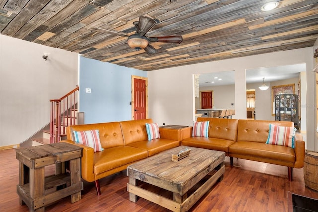 living room with wooden ceiling, hardwood / wood-style floors, and ceiling fan