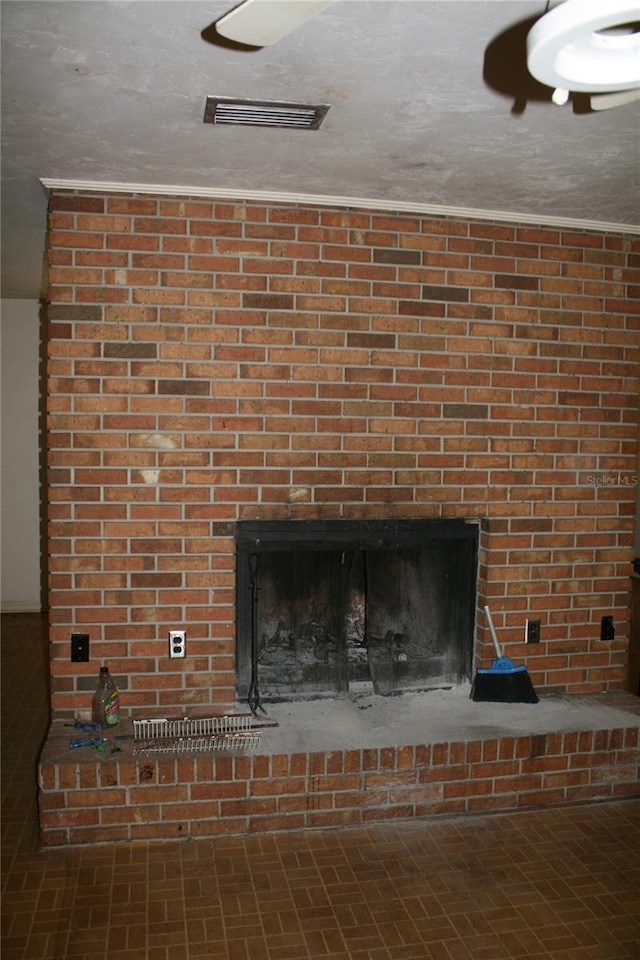 room details featuring a brick fireplace