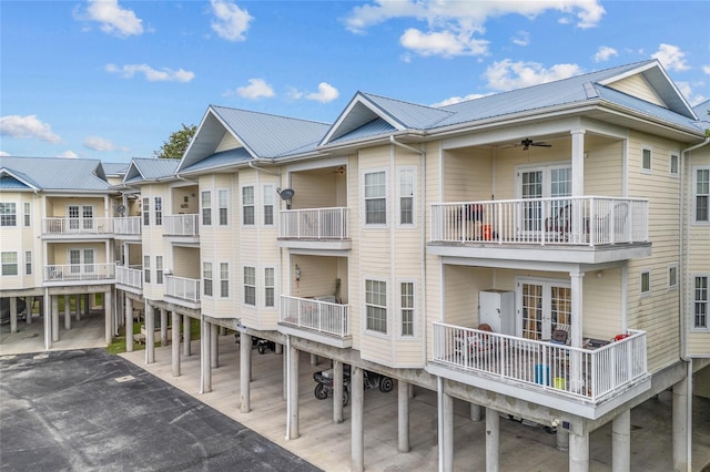 exterior space featuring ceiling fan