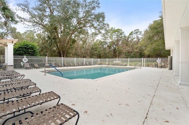 view of swimming pool featuring a patio