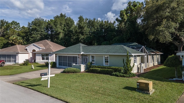 ranch-style home with a garage and a front yard