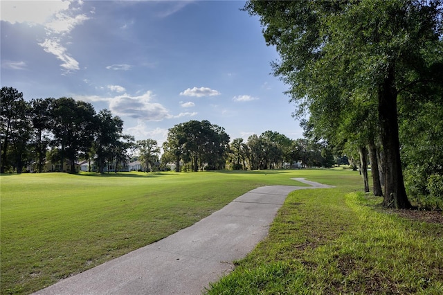 view of home's community featuring a lawn