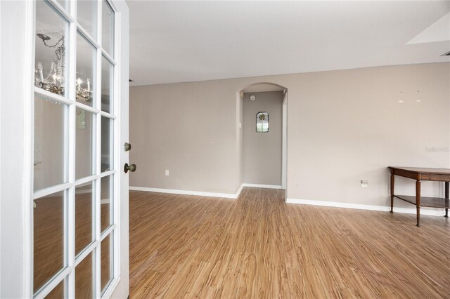 spare room featuring light hardwood / wood-style floors