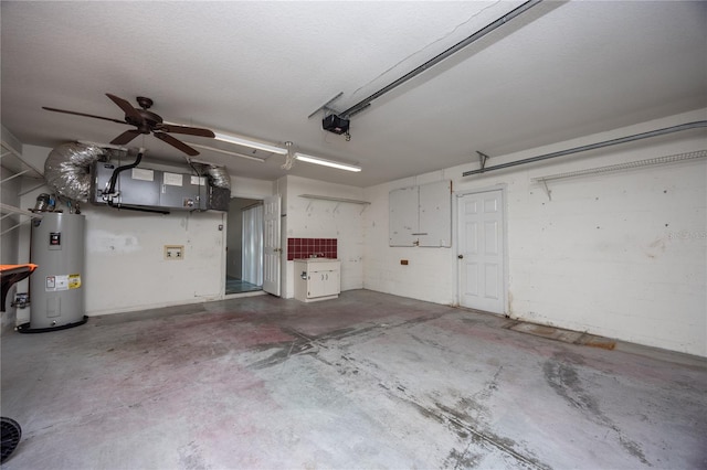 garage with water heater, a garage door opener, and ceiling fan