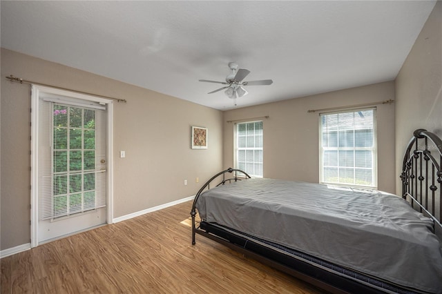 bedroom featuring ceiling fan and light wood-type flooring