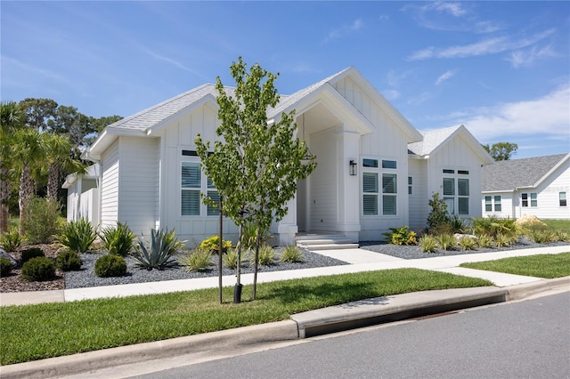 view of front facade with board and batten siding