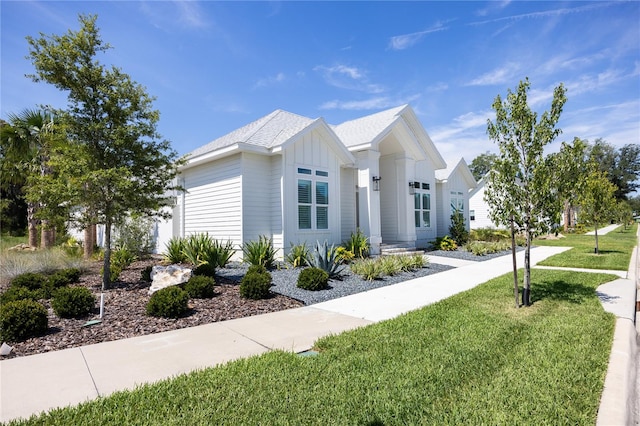 view of front of property with a front lawn