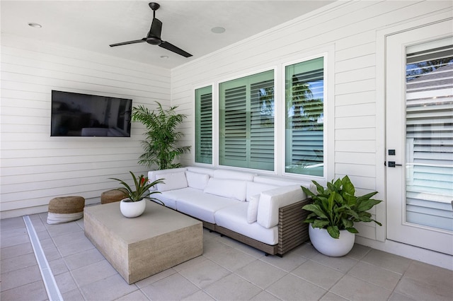 view of patio featuring an outdoor living space and ceiling fan