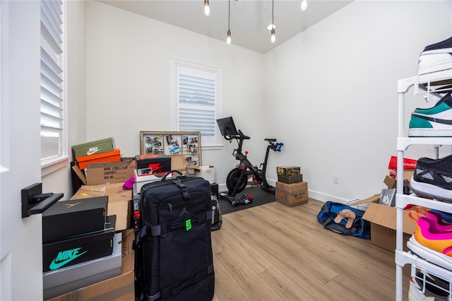 workout room with light wood-type flooring