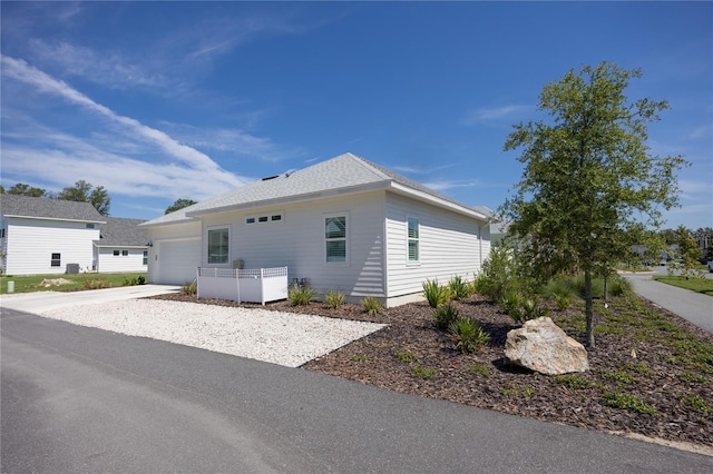 exterior space with a garage