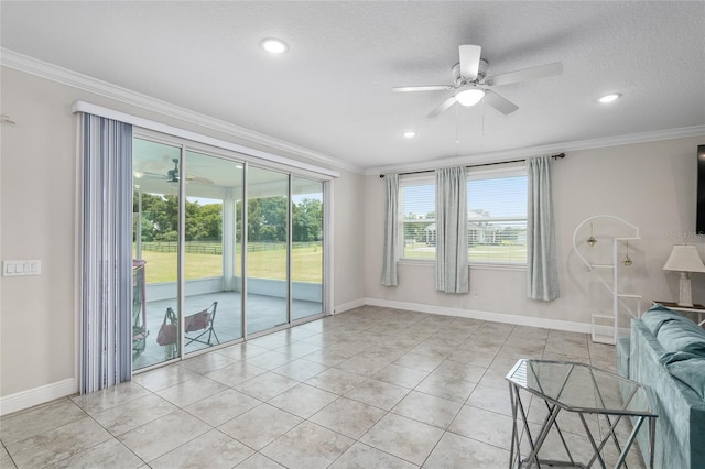 unfurnished living room with a textured ceiling, crown molding, light tile patterned floors, and ceiling fan