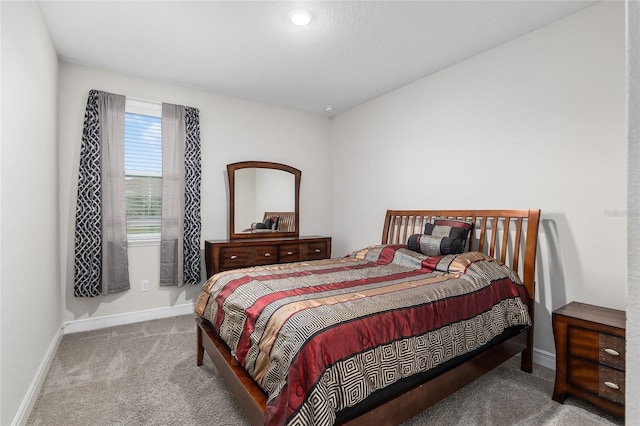 bedroom featuring carpet flooring