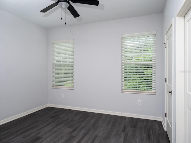 spare room with hardwood / wood-style floors and a healthy amount of sunlight