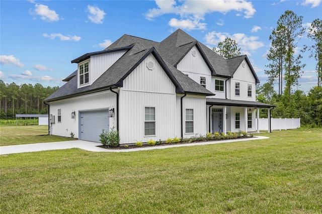 view of front facade with a garage and a front yard