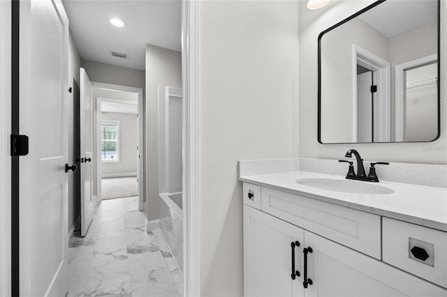 bathroom with vanity and tile patterned flooring