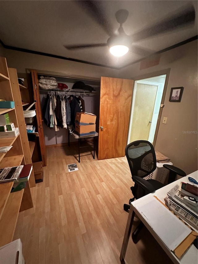 office area with light hardwood / wood-style floors