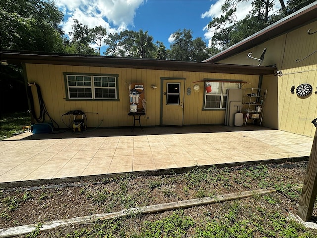 rear view of property with a patio area