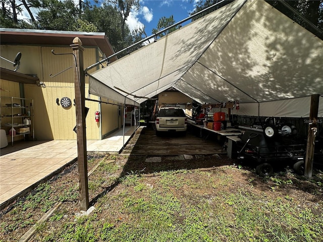 4215 NW 10th St, Gainesville, FL 32609 - view of home's exterior featuring a carport