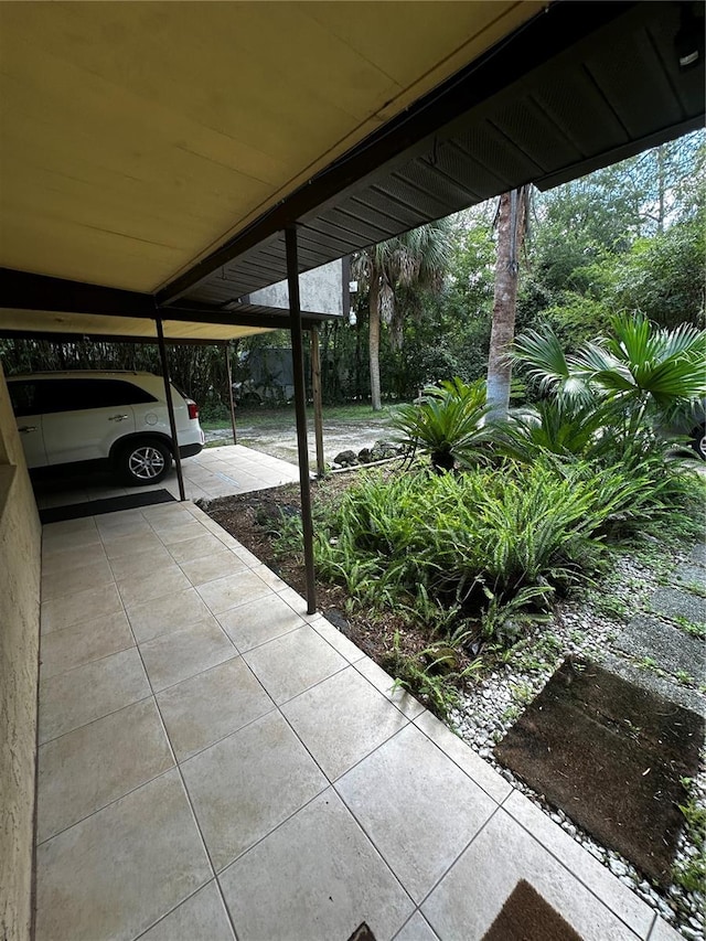 view of patio / terrace featuring a carport