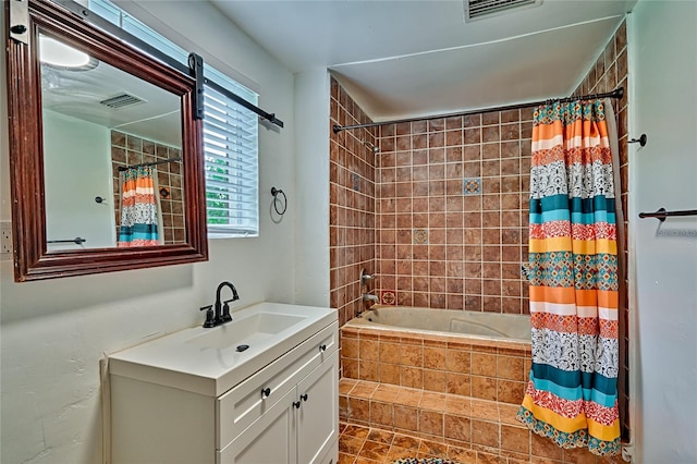 bathroom with shower / bath combination with curtain and vanity