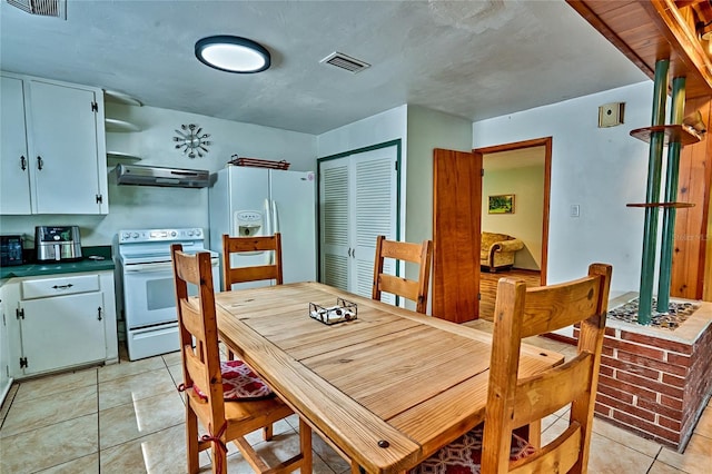 view of tiled dining room