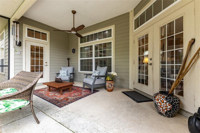 view of patio featuring ceiling fan