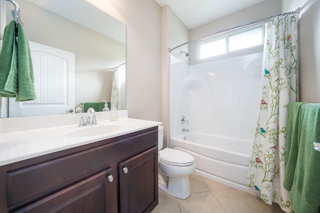 full bathroom featuring toilet, tile patterned floors, vanity, and shower / tub combo with curtain