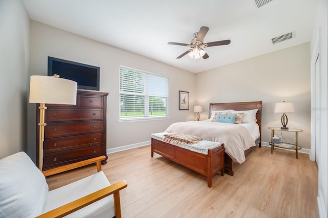 bedroom featuring ceiling fan and light hardwood / wood-style flooring